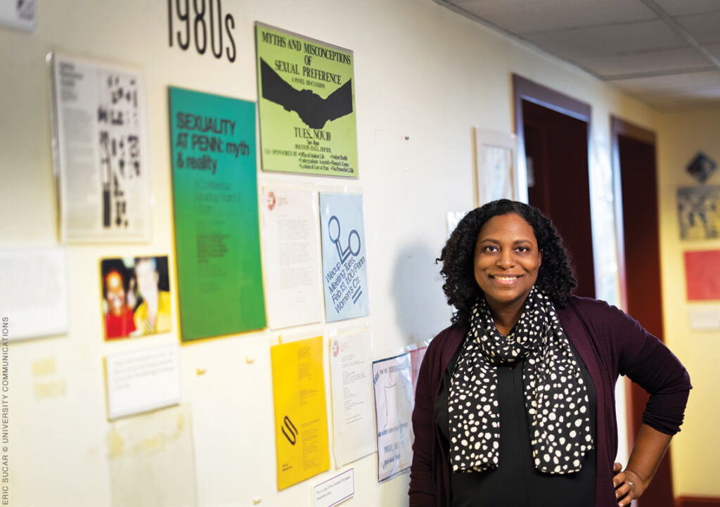 Elisa Foster leans against the wall at the Women's Center